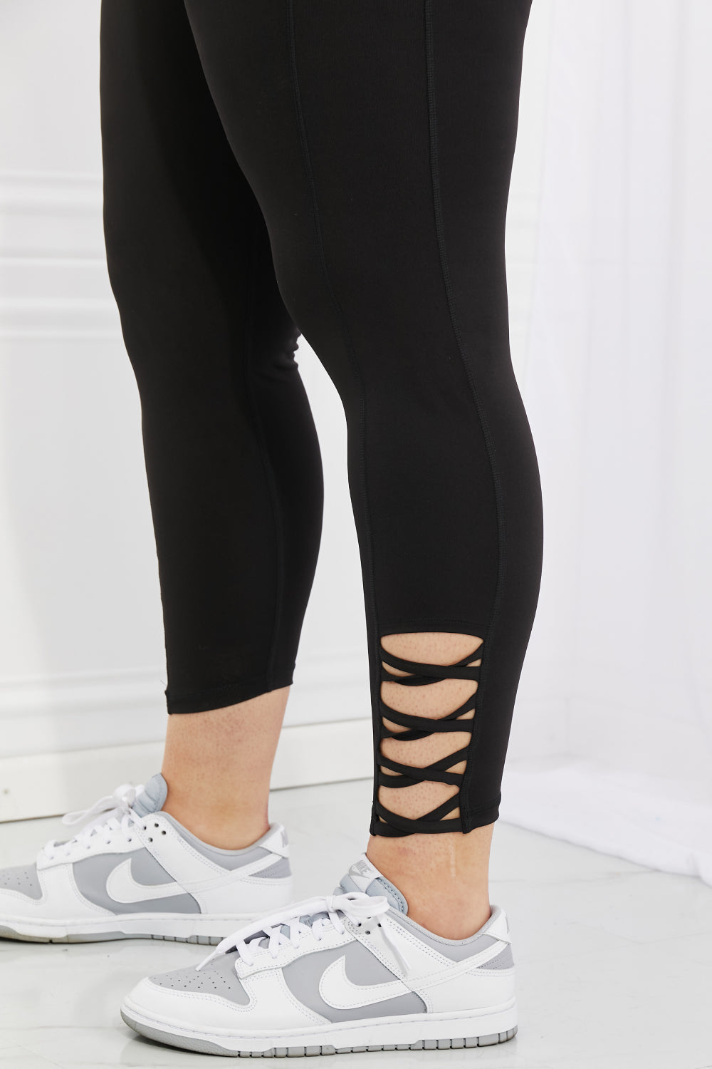 Yelete Ready For Action Full Size Ankle Cutout Active Leggings in Black COCO CRESS