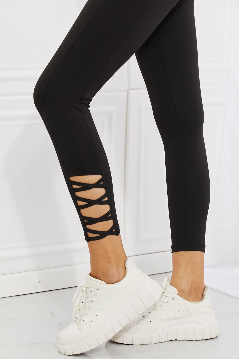 Yelete Ready For Action Full Size Ankle Cutout Active Leggings in Black COCO CRESS